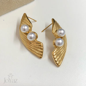 Aretes ali di perle